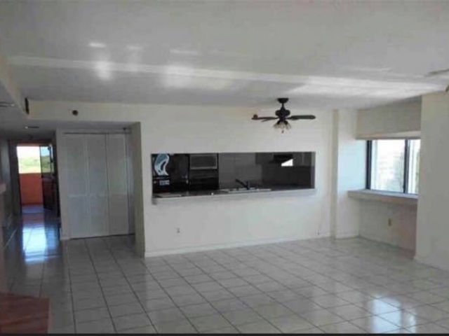 Living room area/fireplace before total remodel.